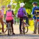Bambini bici zaino scuola parco